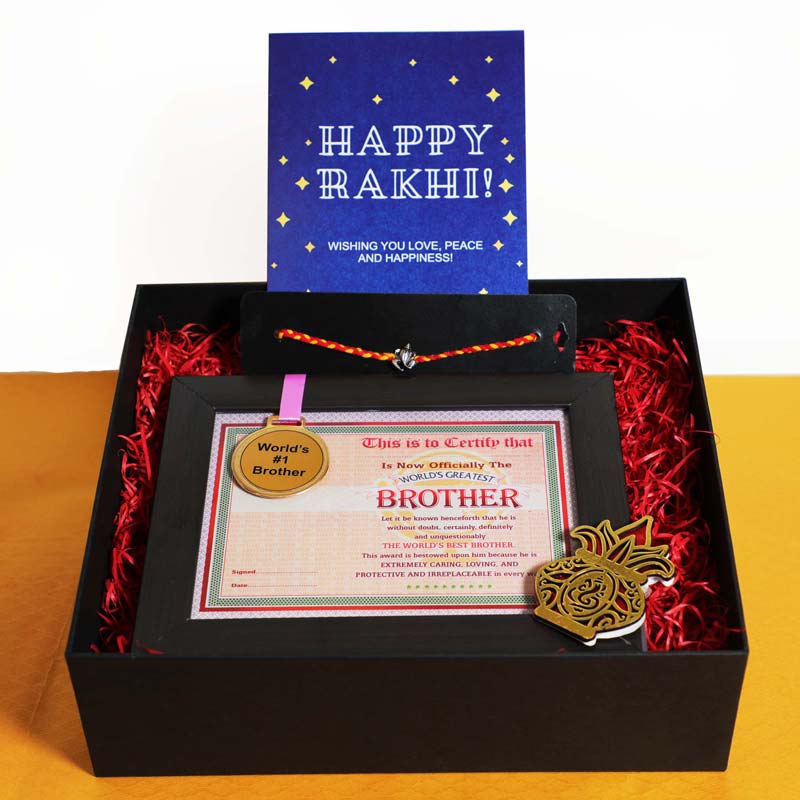 Rakhi Gifts-Big Hamper Box of 20 Goodies with Soan Papdi with 5 Rakhis –  Ghasitaram Gifts